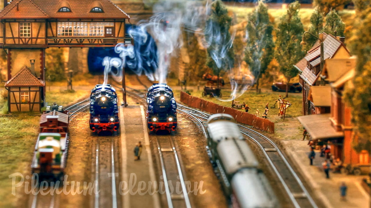 A pretty nice model railway in HO scale with smoking steam locomotives