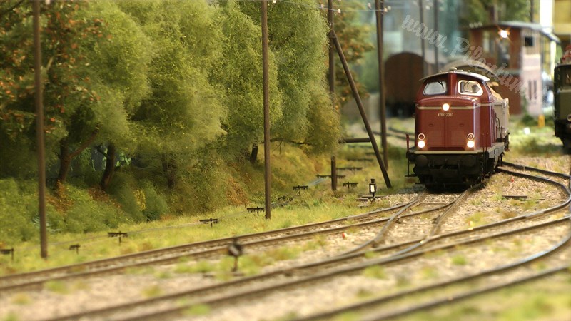 Model trains in O scale with strikingly realistic landscape