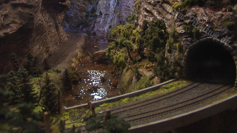 Model Train Layout with Canyon and Rocky Mountains in HO Scale