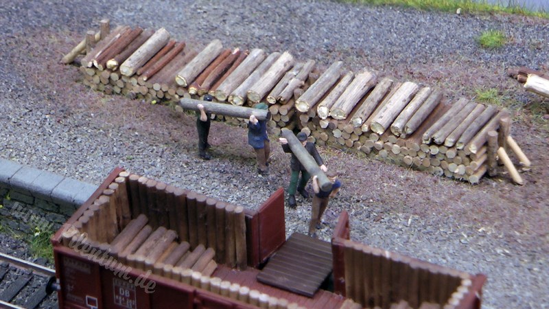 Model railway with station and very realistic landscape in HO scale