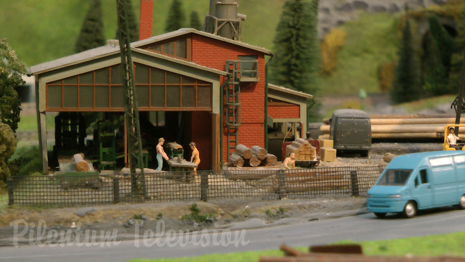 Model Railroad Layout by Modelspoor Group Nienoord with Miniature Cars and more than 100 Trains in HO Scale