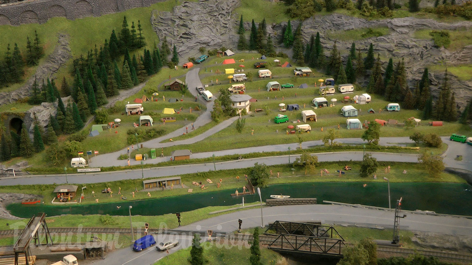 Model Railroad Layout by Modelspoor Group Nienoord with Miniature Cars and more than 100 Trains in HO Scale