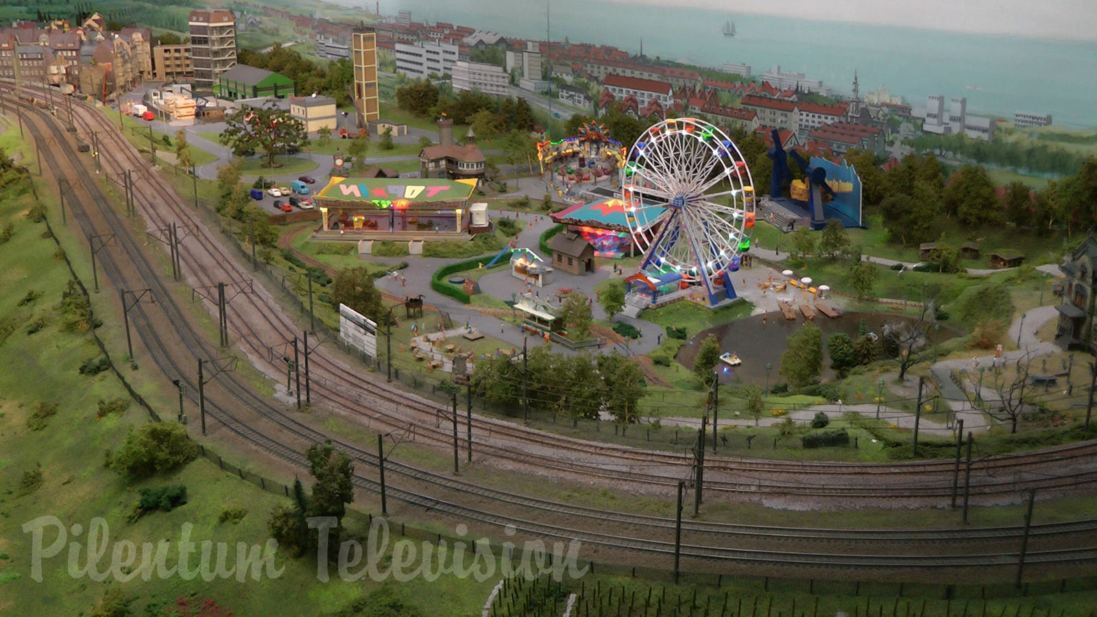 Model Railroad Layout by Modelspoor Group Nienoord with Miniature Cars and more than 100 Trains in HO Scale