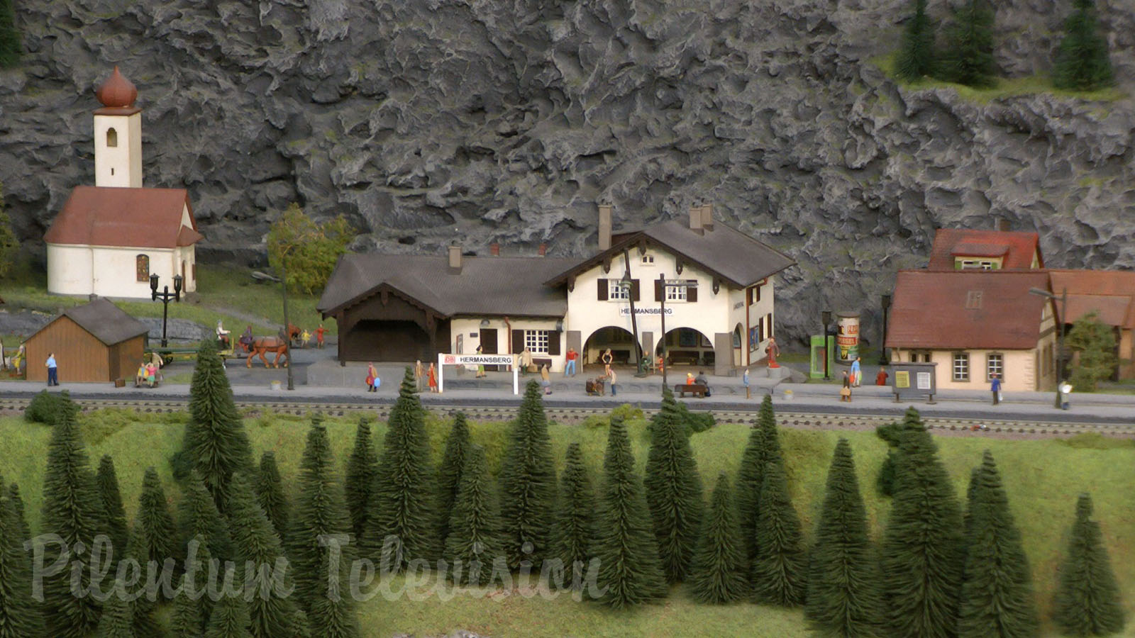 Model Railroad Layout by Modelspoor Group Nienoord with Miniature Cars and more than 100 Trains in HO Scale