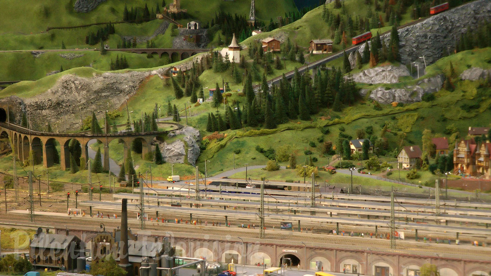 Model Railroad Layout by Modelspoor Group Nienoord with Miniature Cars and more than 100 Trains in HO Scale