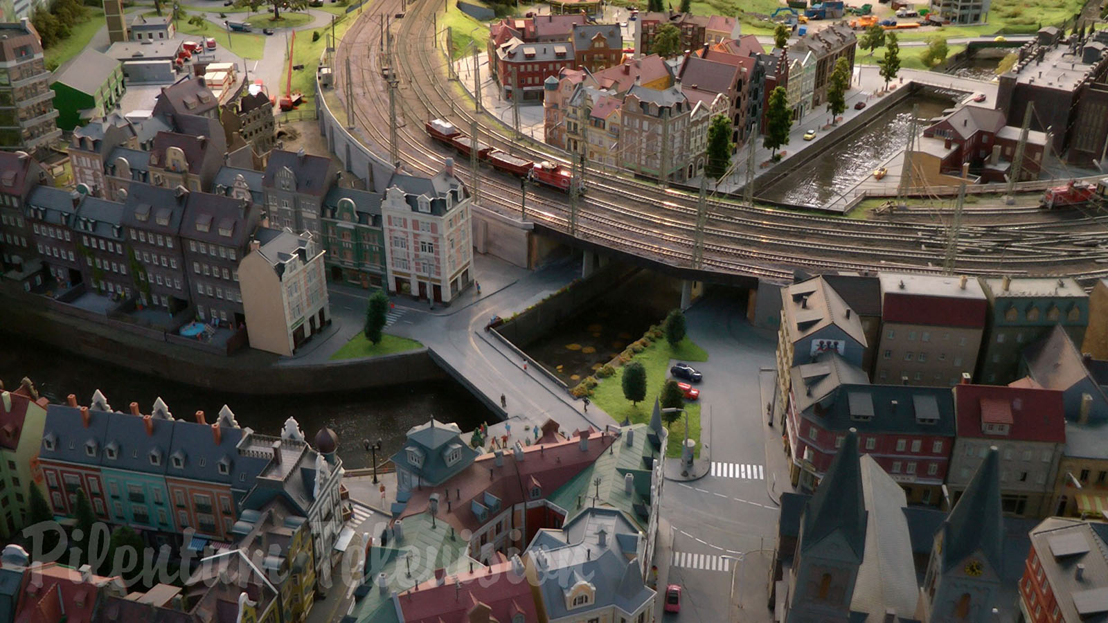 Model Railroad Layout by Modelspoor Group Nienoord with Miniature Cars and more than 100 Trains in HO Scale