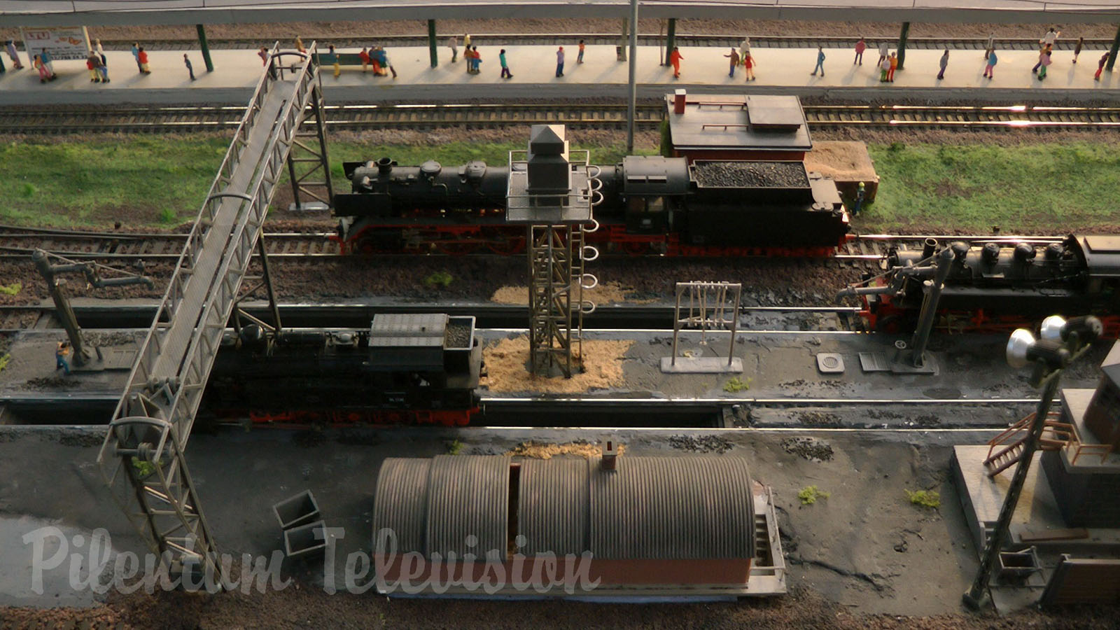 Model Railroad Layout by Modelspoor Group Nienoord with Miniature Cars and more than 100 Trains in HO Scale