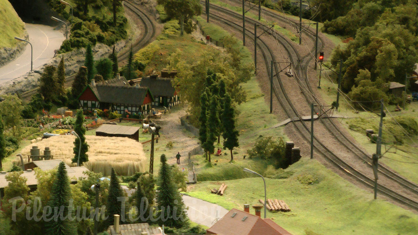 Model Railroad Layout by Modelspoor Group Nienoord with Miniature Cars and more than 100 Trains in HO Scale