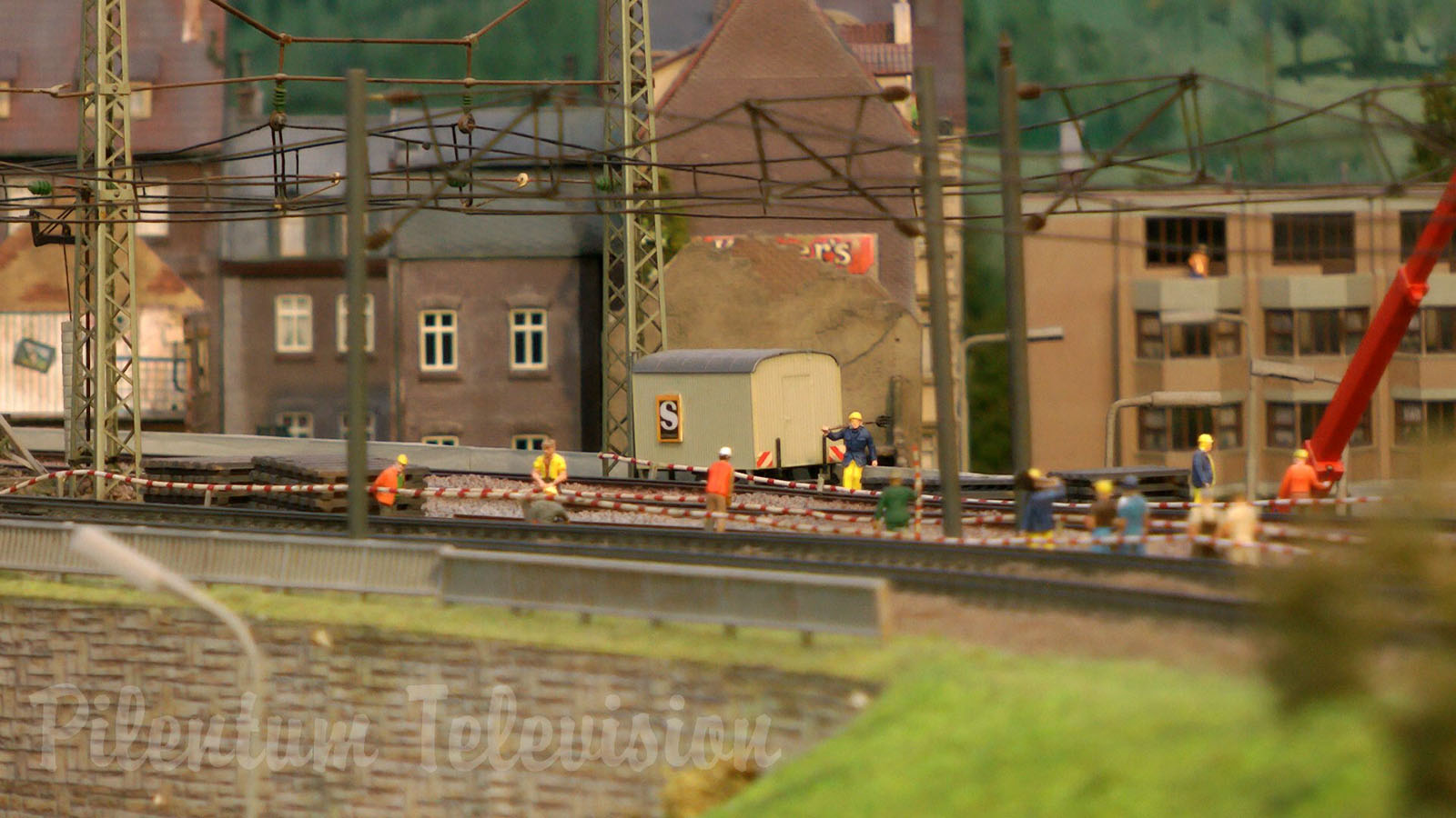 Model Railroad Layout by Modelspoor Group Nienoord with Miniature Cars and more than 100 Trains in HO Scale