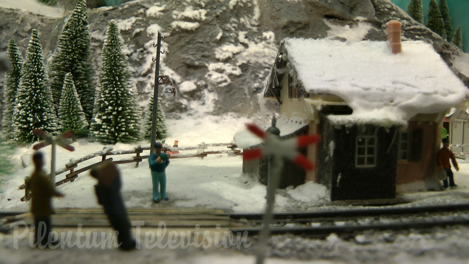 Cute and tiny model railroad layout with winter landscape by Hans Louvet