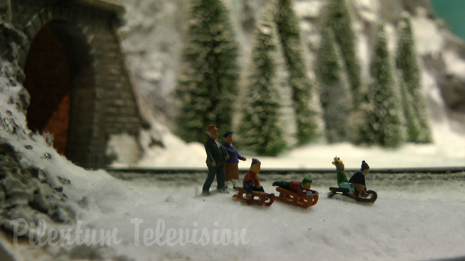 Cute and tiny model railroad layout with winter landscape by Hans Louvet