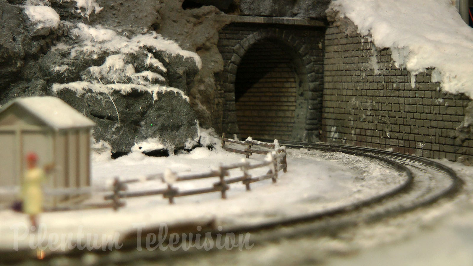 Cute and tiny model railroad layout with winter landscape by Hans Louvet