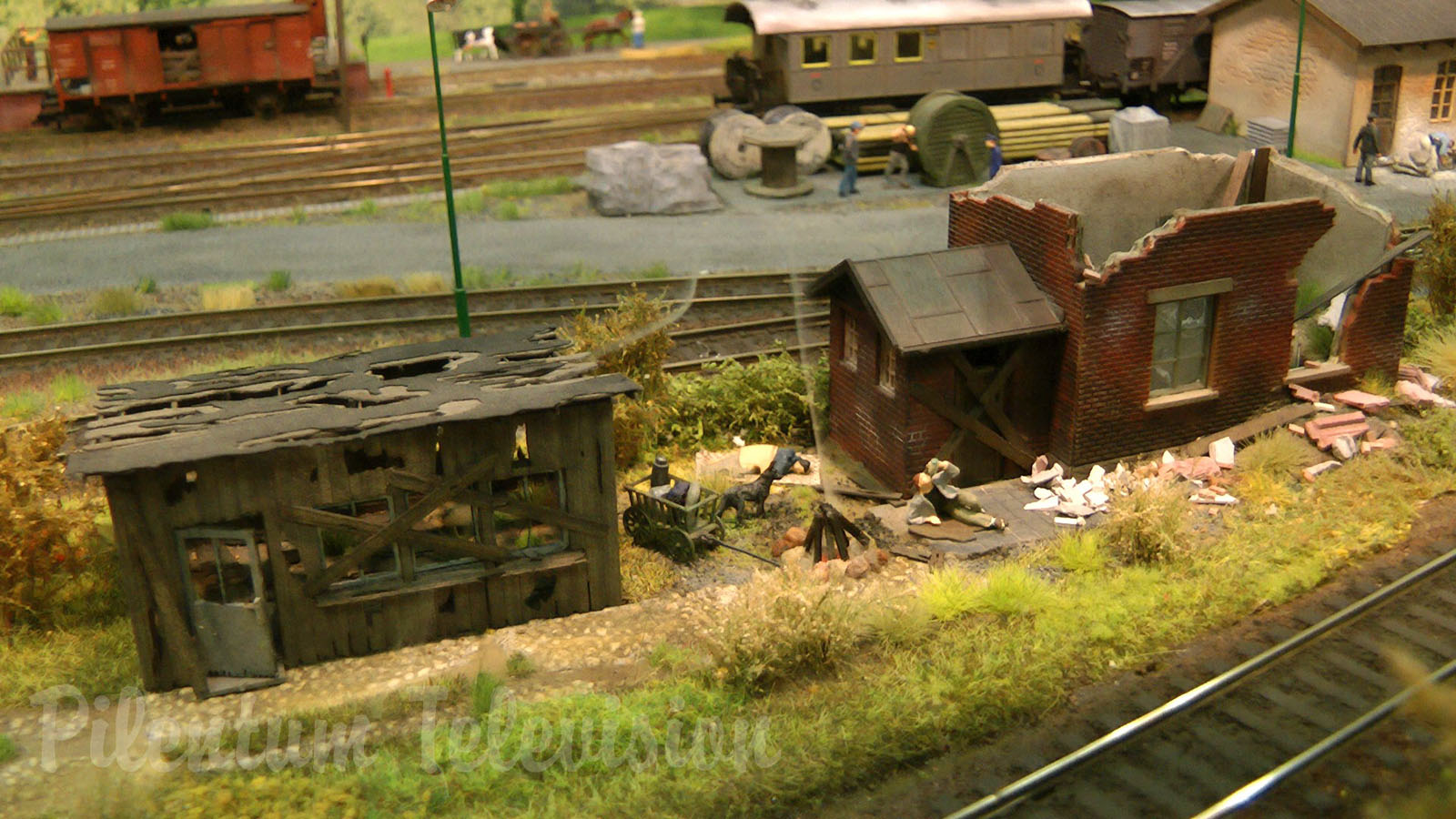 Model Railroad Layout with Steam Locomotive Depot in World War II