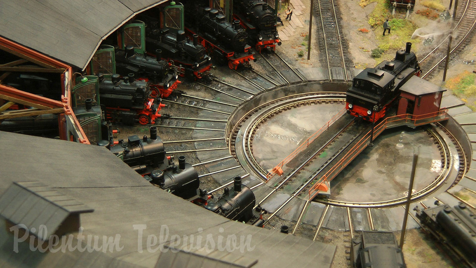 Model Railroad Layout with Steam Locomotive Depot in World War II