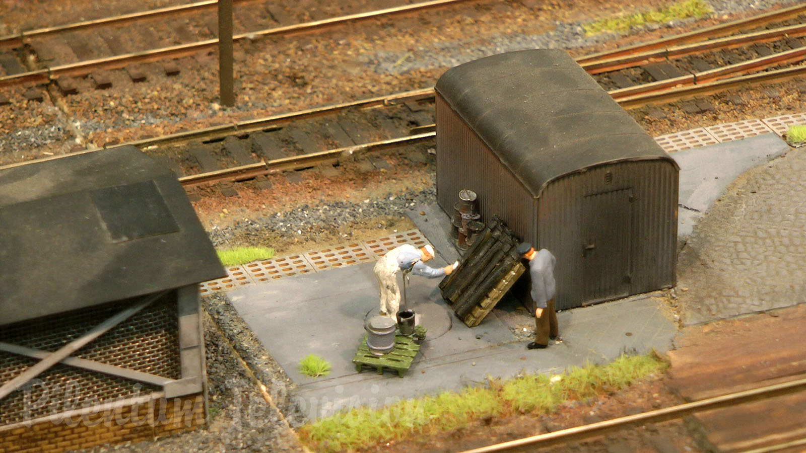 Model Railroad Layout with Steam Locomotive Depot in World War II