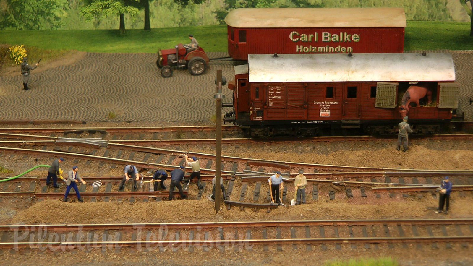 Model Railroad Layout with Steam Locomotive Depot in World War II