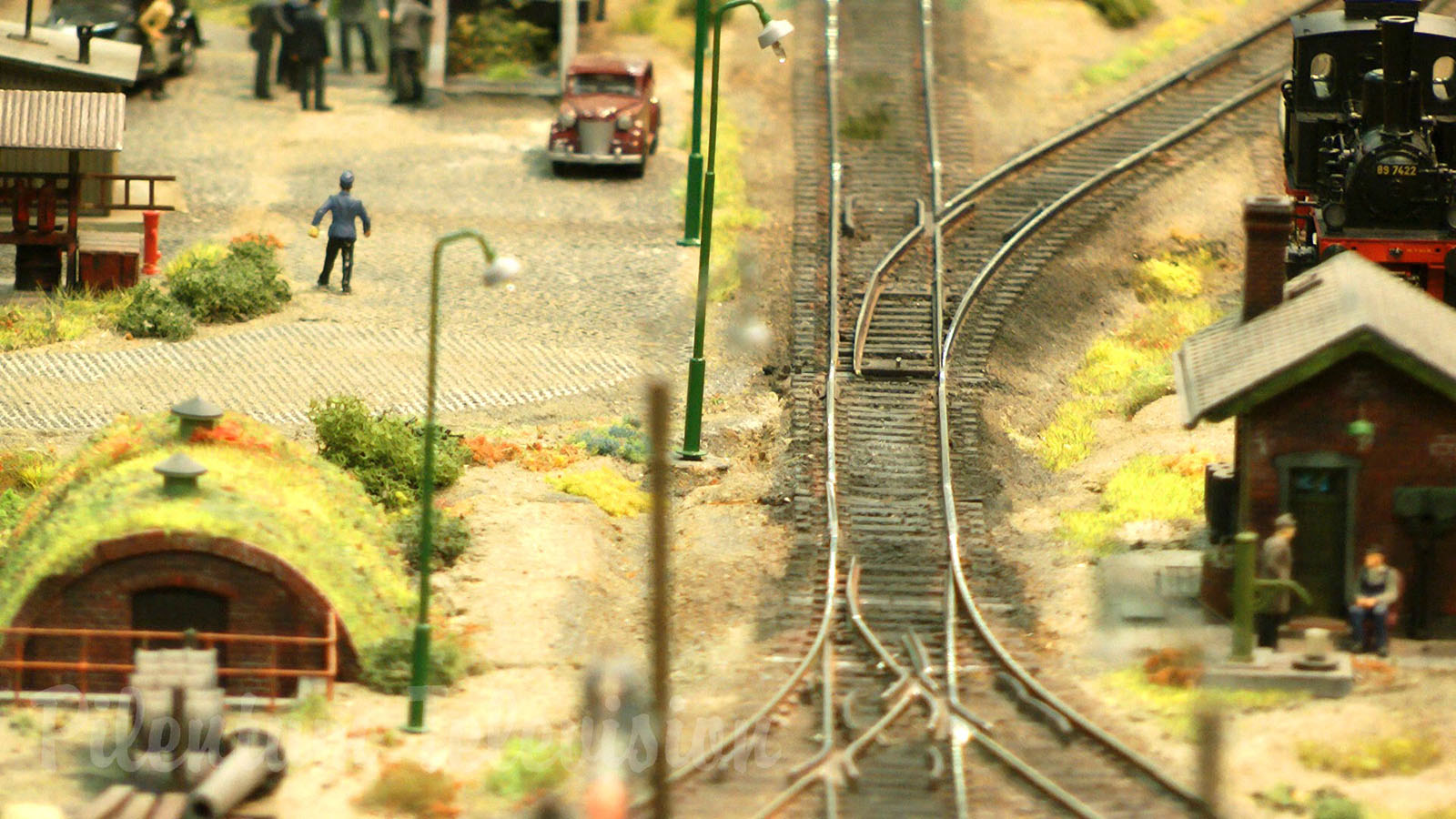 Model Railroad Layout with Steam Locomotive Depot in World War II