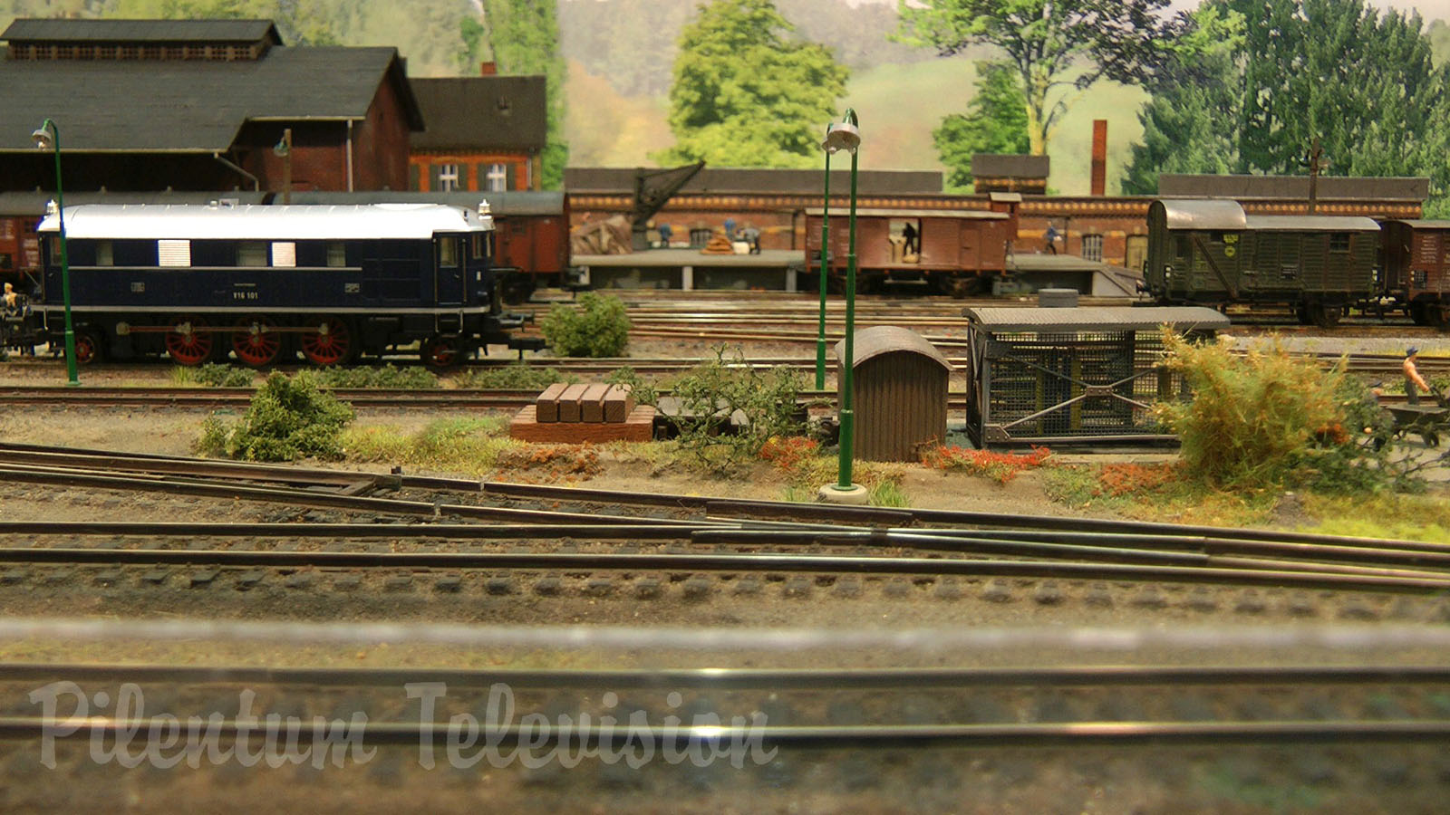 Model Railroad Layout with Steam Locomotive Depot in World War II