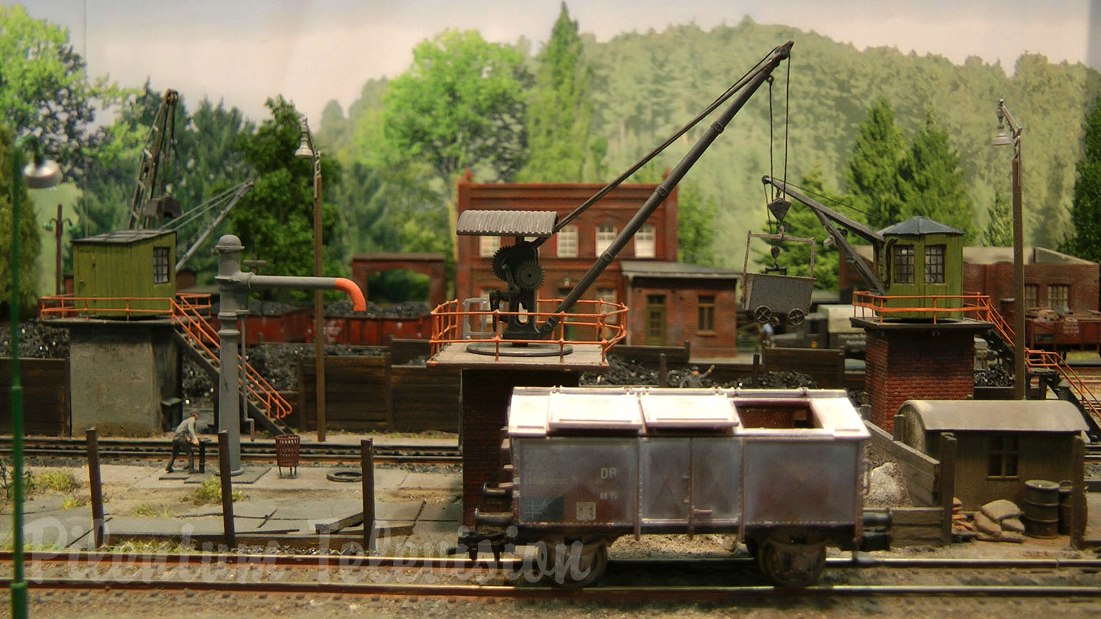 Model Railroad Layout with Steam Locomotive Depot in World War II