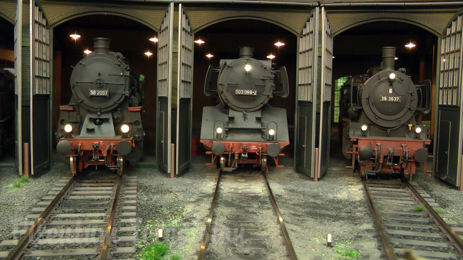 Steam locomotives on an amazing model railroad layout in scale 1/32