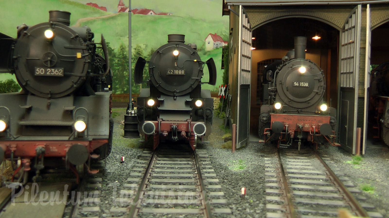 Steam locomotives on an amazing model railroad layout in scale 1/32