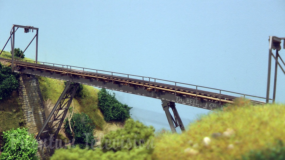 Model trains in action at the famous Gletsch railway station in Switzerland