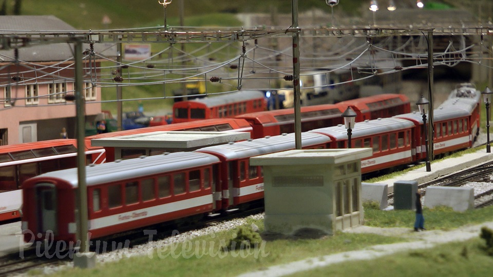 Model trains in action at the famous Gletsch railway station in Switzerland