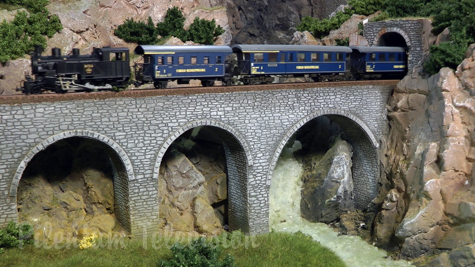 Model trains in action at the famous Gletsch railway station in Switzerland