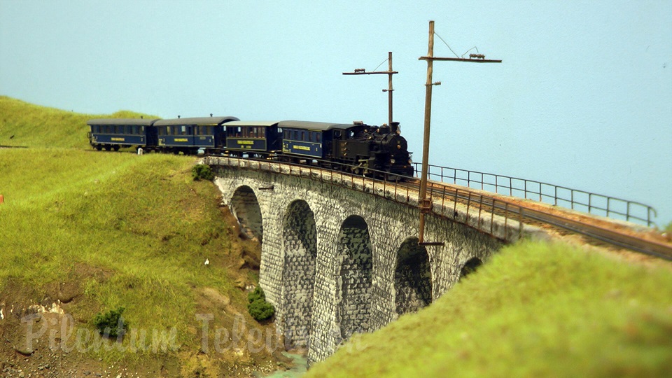 Model trains in action at the famous Gletsch railway station in Switzerland