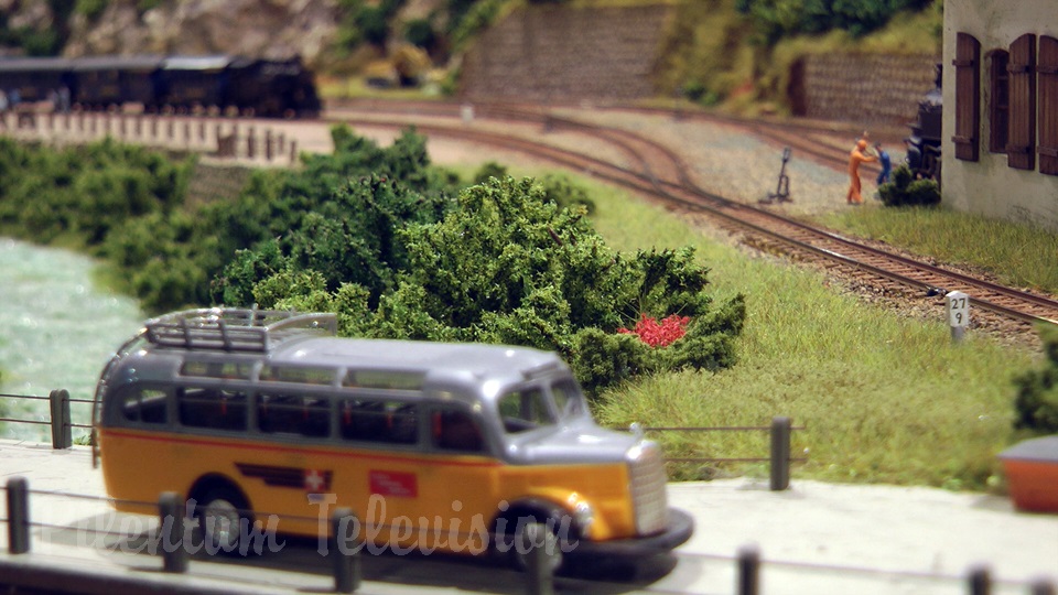 Model trains in action at the famous Gletsch railway station in Switzerland