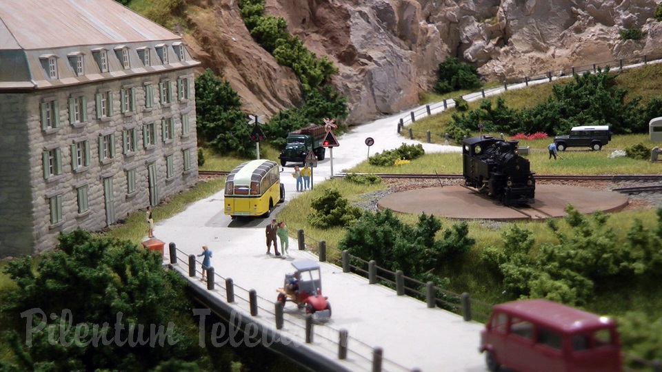 Model trains in action at the famous Gletsch railway station in Switzerland