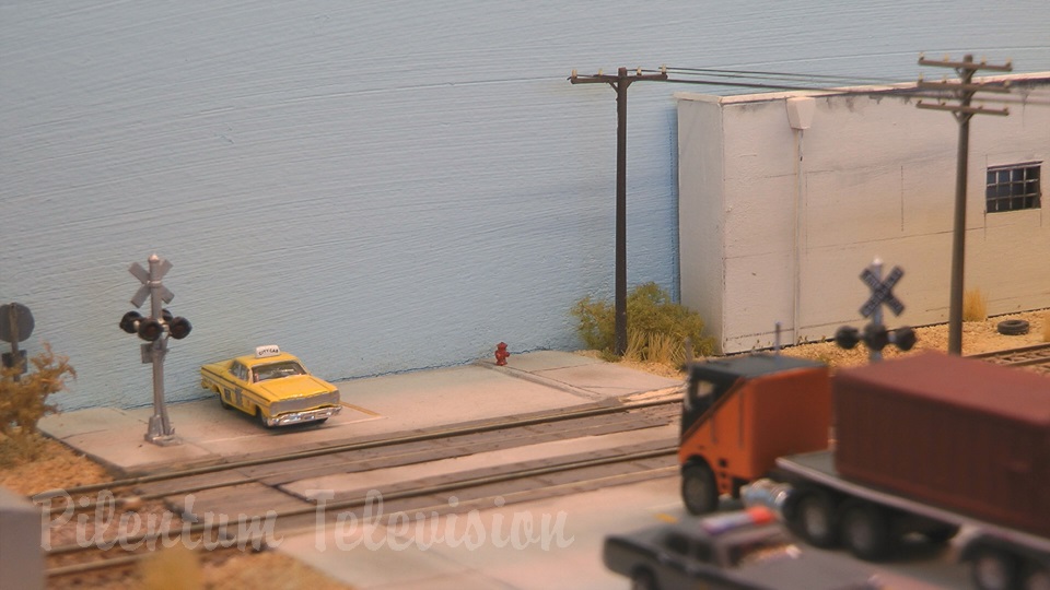 N scale model railroad diorama with freight trains