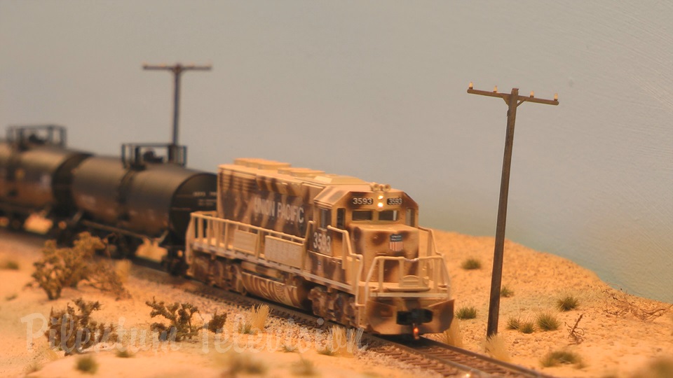 N scale model railroad diorama with freight trains