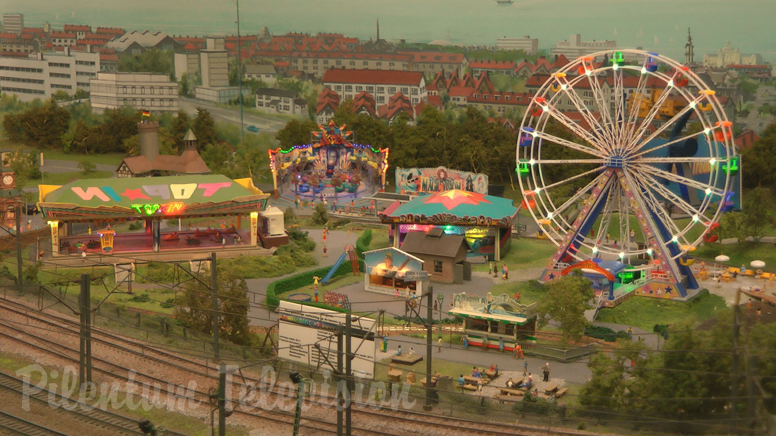 Oktoberfest in Munich - World's Largest Beer Festival and Funfair with Roller Coaster and Bumper Car