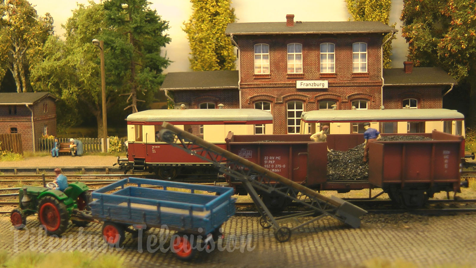 Model Railway Layout with Steam Locomotive and Diesel Railcars from Prussia in HO Scale