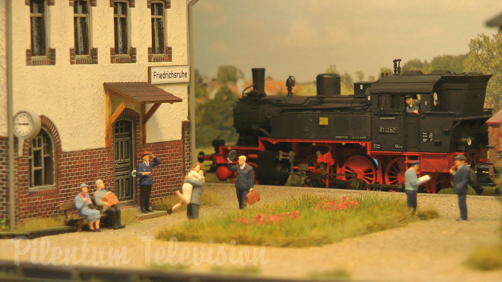 Model Railway Layout with Steam Locomotive and Diesel Railcars from Prussia in HO Scale