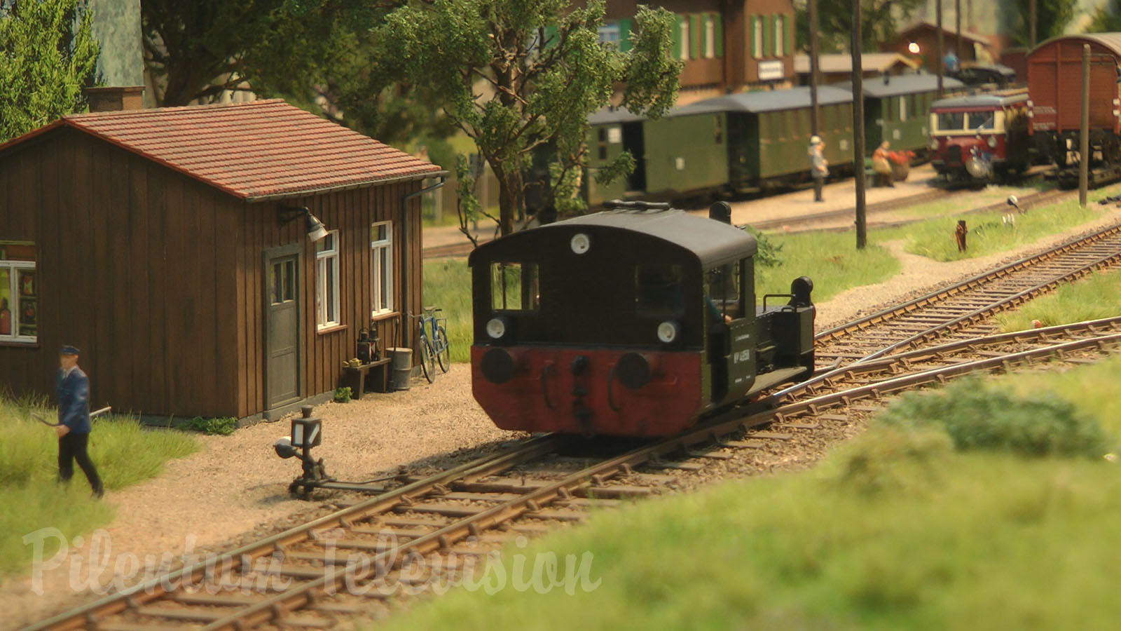 Model Railroad Layout in O Scale with Narrow Gauge Steam Locomotives and Diesel Railcars