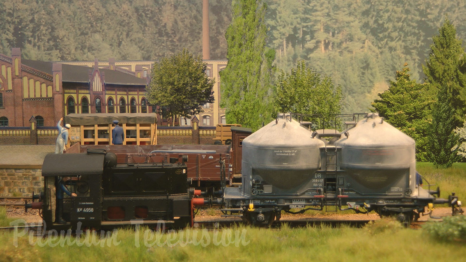 Model Railroad Layout in O Scale with Narrow Gauge Steam Locomotives and Diesel Railcars