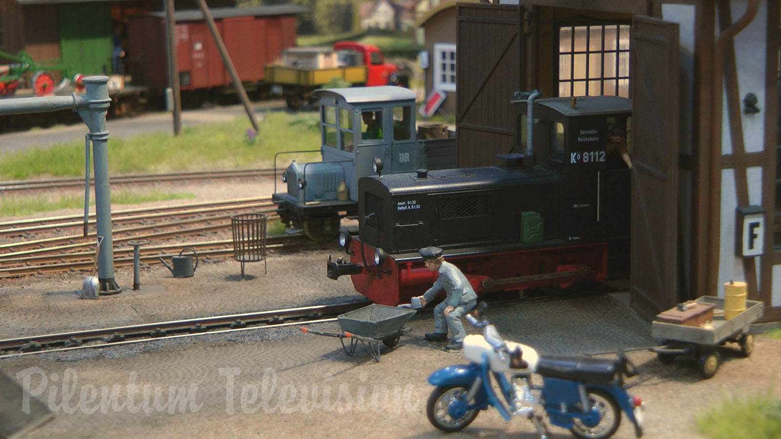 Model Railroad Layout in O Scale with Narrow Gauge Steam Locomotives and Diesel Railcars